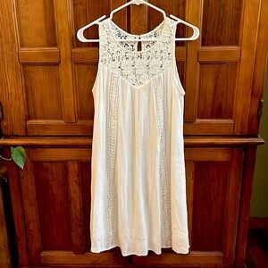 Old Navy knee length white dress with floral lace pattern.